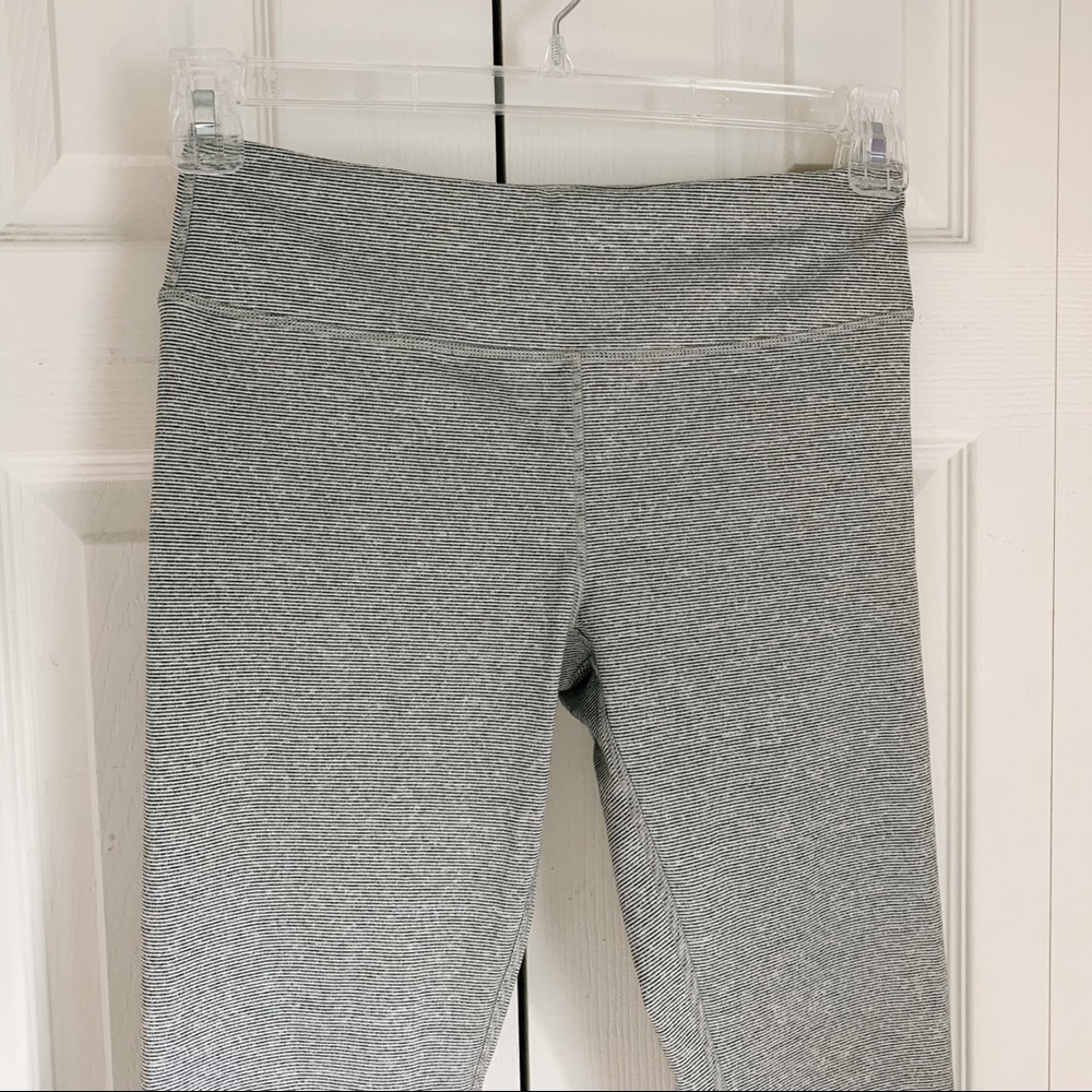 Gray and white striped workout leggings